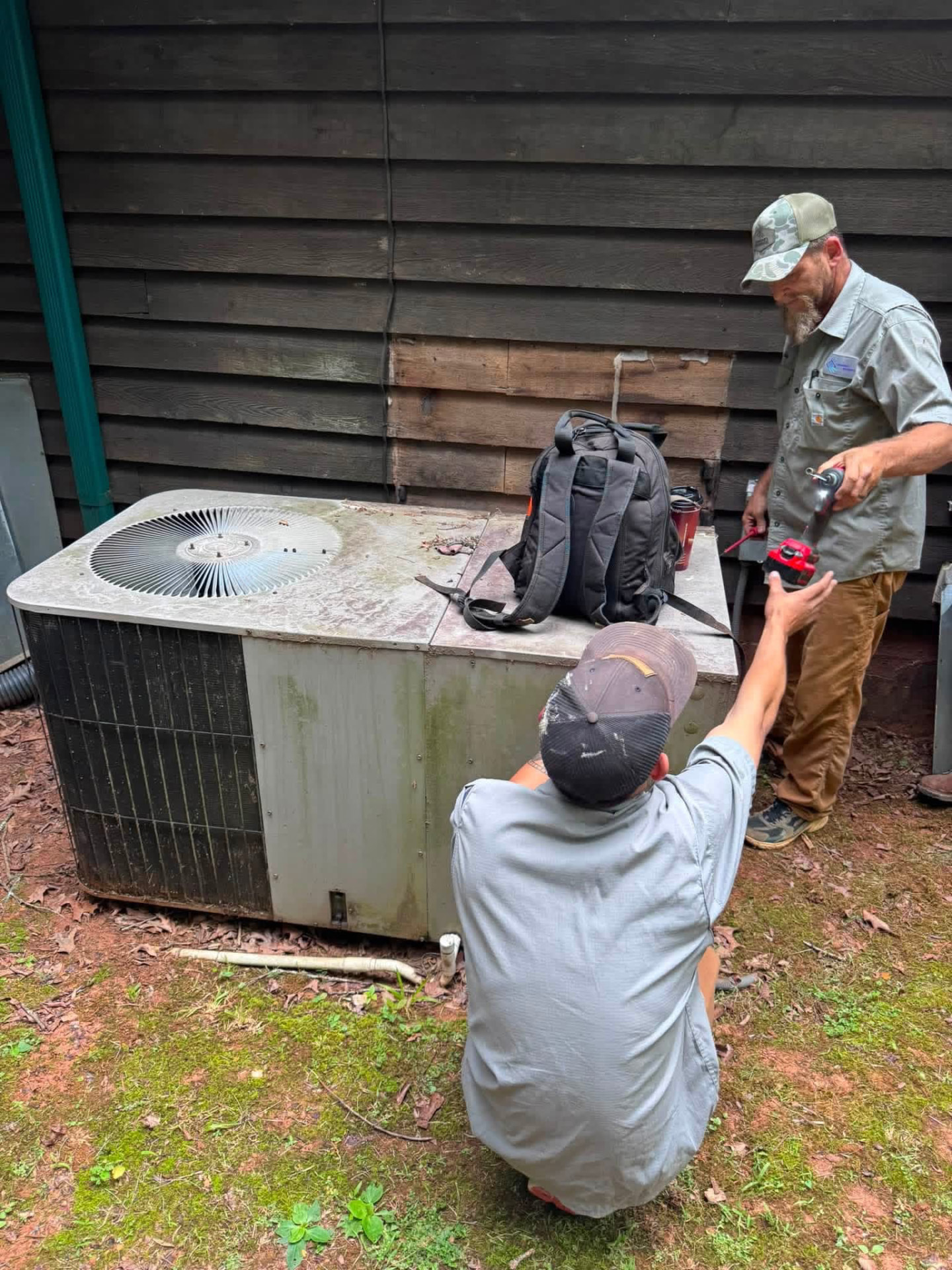 Crawford's Mechanical technicians on a service call
